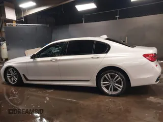2019 BMW 7 Series 740i xDrive with VIN WBA7E4C59KGV70391, listed as a IAAI auction lot 41531991 with 70,017 mi miles and . Bid and sale history available at carsss.com. Image 14.