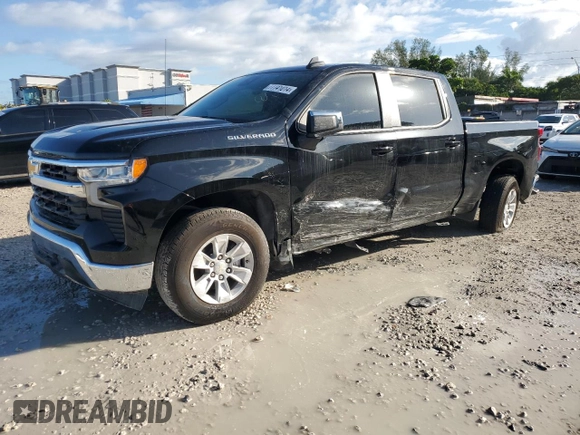 2024 Chevrolet Silverado 1500 LT with VIN 1GCPACEK7RZ172204, listed as a Copart auction lot 77741014 with 9,590 mi miles and Salvage Title. Bid and sale history available at DreamBid. Image 1.