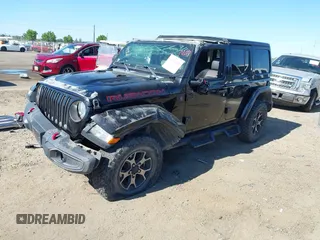 2018 Jeep Wrangler Unlimited Rubicon with VIN 1C4HJXFGXJW255881, listed as a IAAI auction lot 42316499 with 39,439 mi miles and . Bid and sale history available at DreamBid. Image 18.
