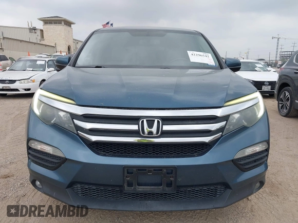2017 Honda Pilot EX-L with VIN 5FNYF5H88HB042003, listed as a IAAI auction lot 42296542 with 172,823 mi miles and . Bid and sale history available at DreamBid. Image 6.
