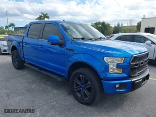 2015 Ford F-150 XL with VIN 1FTEW1CG2FKE28717, listed as a IAAI auction lot 41433414 with 104,752 mi miles. Bid and sale history available at carsss.com. Image 1.