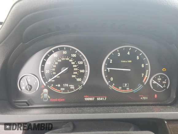 2012 BMW 7 Series 740Li with VIN WBAKB4C59CC576476, listed as a Copart auction lot 55670215 with 100,907 mi miles and Salvage title. Bid and sale history available at DreamBid. Image 9.