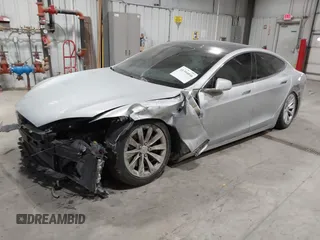 2017 Tesla Model S 100D with VIN 5YJSA1E23HF232059, listed as a IAAI auction lot 41394046 with 84,052 mi miles and . Bid and sale history available at DreamBid. Image 2.