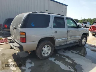 2005 GMC Yukon SLE z VIN 1GKEC13T75J179930, wystawiony jako Copart lot #57259205 z przebiegiem 310 454 mil mil oraz Szkody całkowita. Historia ofert i sprzedaży dostępna na DreamBid. Obrazek 3.
