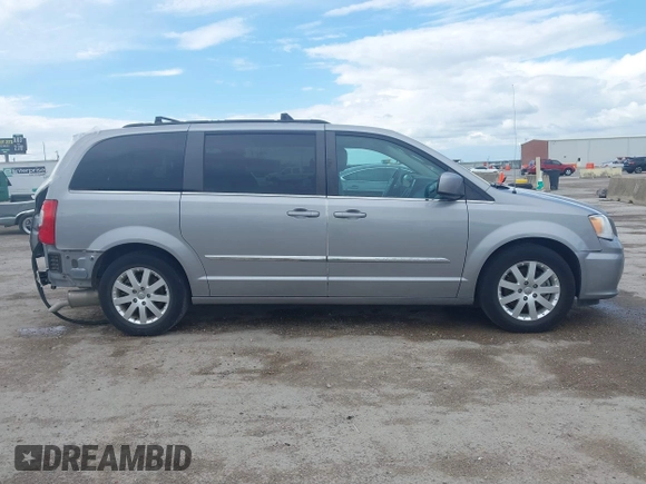 2016 Chrysler Town & Country Touring with VIN 2C4RC1BG0GR213058, listed as a IAAI auction lot 41910462 with 125,013 mi miles and . Bid and sale history available at DreamBid. Image 13.