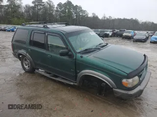 2000 Ford Explorer XLT z VIN 1FMDU83PXYZB03135, wystawiony jako Copart lot #45352705 z przebiegiem 228 604 mil mil oraz Szkoda całkowita • Salvage title. Historia ofert i sprzedaży dostępna na DreamBid. Obrazek 4.