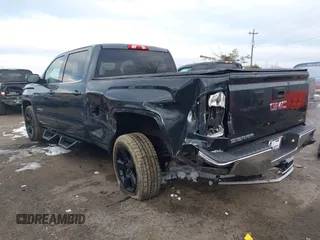 2017 GMC Sierra 1500 SLE with VIN 3GTU2MEC6HG319366, listed as a IAAI auction lot 41351311 with 123,097 mi miles and . Bid and sale history available at DreamBid. Image 3.