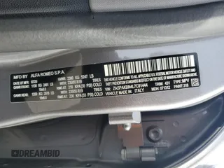 2020 Alfa Romeo Stelvio Ti z VIN ZASPAKBN4L7C91444, wystawiony jako Copart lot #43635865 z przebiegiem 83 848 mil mil oraz Szkoda całkowita • Salvage title. Historia ofert i sprzedaży dostępna na DreamBid. Obrazek 13.