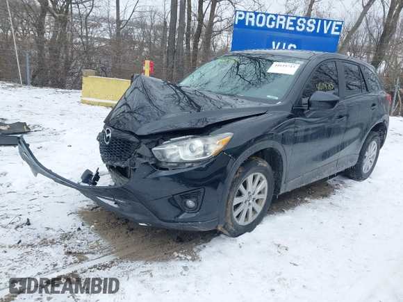 2014 Mazda CX-5 Touring with VIN JM3KE4CY8E0416590, listed as a IAAI auction lot 41619713 with 225,156 mi miles. Bid and sale history available at carsss.com. Image 18.