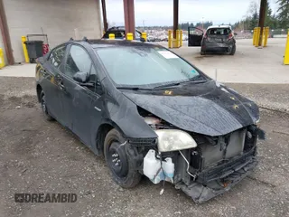 2020 Toyota Prius L Eco z VIN JTDKARFUXL3115471, wystawiony jako IAAI lot #41831411 z przebiegiem 48 378 mil mil oraz . Historia ofert i sprzedaży dostępna na DreamBid. Obrazek 1.
