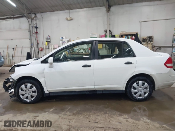 2009 Nissan Versa 1.8 S with VIN 3N1BC11E19L382848, listed as a IAAI auction lot 41929836 with 185,990 mi miles. Bid and sale history available at carsss.com. Image 14.