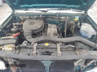 1996 Nissan Frontier XE with VIN 1N6SD16SXTC322219, listed as a Copart auction lot 49043685 with 102,964 mi miles and Salvage title. Bid and sale history available at DreamBid. Image 12.