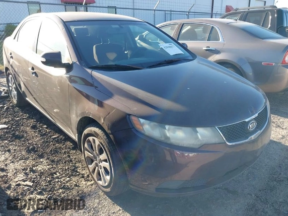 2010 Kia Forte EX with VIN KNAFU4A26A5306448, listed as a IAAI auction lot 42048677 with 172,095 mi miles. Bid and sale history available at carsss.com. Image 1.