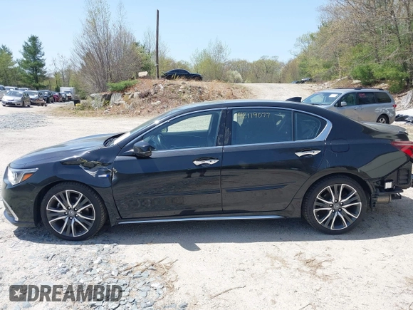2018 Acura RLX Hybrid Sport z VIN JH4KC2F9XJC000524, wystawiony jako IAAI lot #42119077 z przebiegiem 60 381 mil mil oraz . Historia ofert i sprzedaży dostępna na DreamBid. Obrazek 15.