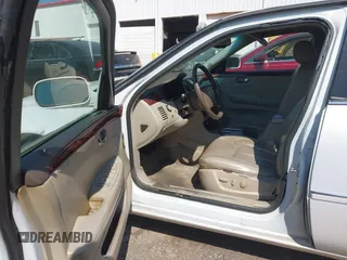 2006 Cadillac DTS w/1SC with VIN 1G6KD57Y56U132648, listed as a IAAI auction lot 41862030 with 128,003 mi miles. Bid and sale history available at carsss.com. Image 5.