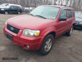 2005 Ford Escape Limited with VIN 1FMYU94155KA52665, listed as a IAAI auction lot 41736416 with 999,999 mi miles. Bid and sale history available at carsss.com. Image 2.