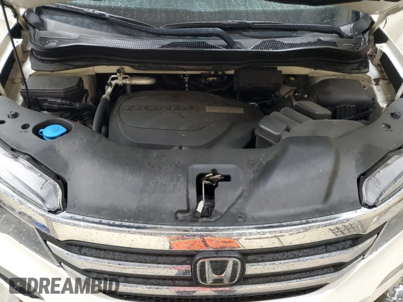 2018 Honda Pilot EX-L with VIN 5FNYF6H62JB043318, listed as a Copart auction lot 57853335 with 57,354 mi miles and Salvage title. Bid and sale history available at DreamBid. Image 12.
