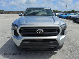 2024 Toyota Tacoma SR5 with VIN 3TMKB5FN8RM002169, listed as a Copart auction lot 60308275 with 5,789 mi miles and Clean title. Bid and sale history available at DreamBid. Image 5.