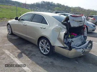 2013 Cadillac ATS Premium z VIN 1G6AE5S33D0101388, wystawiony jako IAAI lot #41921020 z przebiegiem 160 616 mil mil oraz . Historia ofert i sprzedaży dostępna na DreamBid. Obrazek 3.