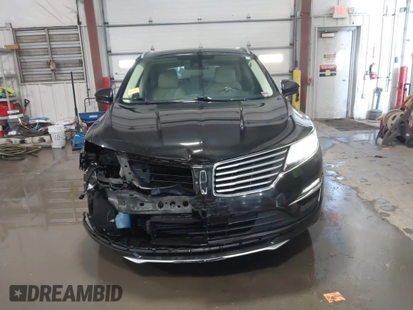 2015 Lincoln MKC with VIN 5LMCJ1A98FUJ10348, listed as a IAAI auction lot 41566416 with 133,035 mi miles and . Bid and sale history available at DreamBid. Image 6.