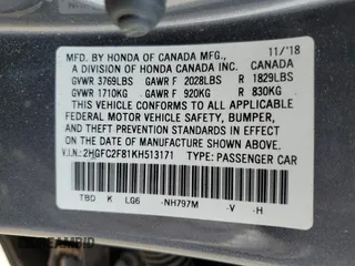2019 Honda Civic Sport with VIN 2HGFC2F81KH513171, listed as a Copart auction lot 54030235 with 57,516 mi miles and Salvage Title. Bid and sale history available at DreamBid. Image 12.