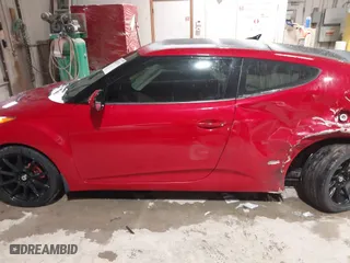 2012 Hyundai Veloster w/Black Int with VIN KMHTC6AD8CU032759, listed as a IAAI auction lot 41567265 with 156,973 mi miles. Bid and sale history available at carsss.com. Image 14.