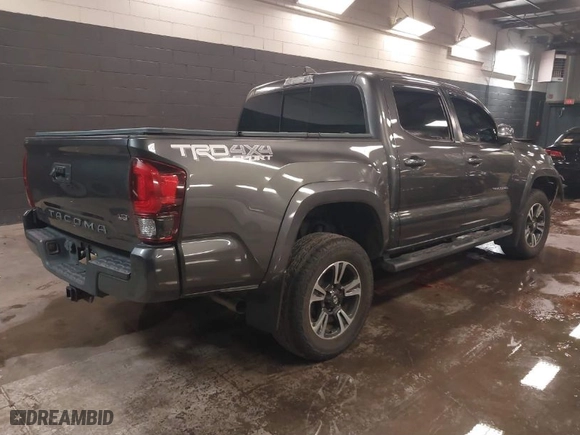 2018 Toyota Tacoma SR with VIN 3TMCZ5AN9JM135891, listed as a IAAI auction lot 41551990 with 80,235 mi miles. Bid and sale history available at carsss.com. Image 4.