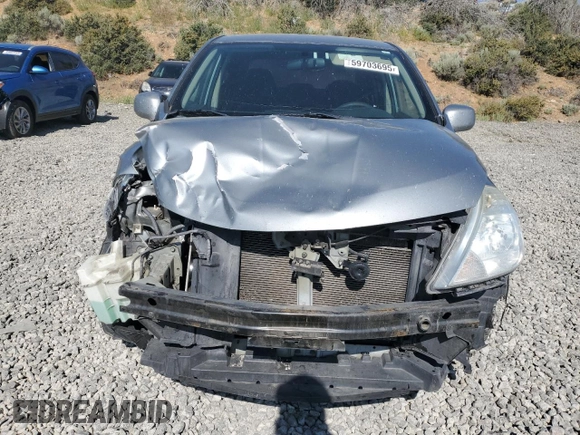 2010 Nissan Versa S with VIN 3N1BC1AP8AL457552, listed as a Copart auction lot 59703695 with 149,160 mi miles and Salvage title. Bid and sale history available at DreamBid. Image 5.