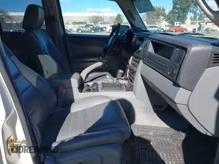 2007 Jeep Commander Sport z VIN 1J8HH48K27C510392, wystawiony jako IAAI lot #41793028 z przebiegiem 139 686 mil mil oraz . Historia ofert i sprzedaży dostępna na DreamBid. Obrazek 5.