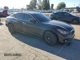 2013 Infiniti M with VIN JN1BY1AP3DM511240, listed as a Copart auction lot 49737185 with 116,644 mi miles and Salvage title. Bid and sale history available at DreamBid. Image 4.