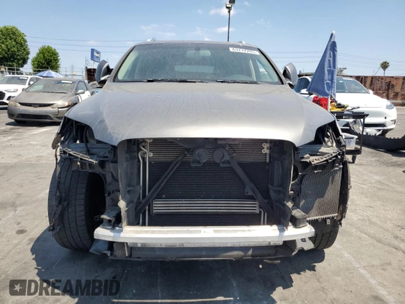 2015 Audi Q7 Premium Plus with VIN WA1LGAFE5FD012965, listed as a Copart auction lot 63712265 with 64,851 mi miles and Salvage title. Bid and sale history available at DreamBid. Image 5.