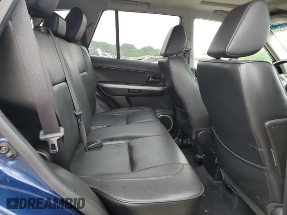 2012 Suzuki Grand Vitara Limited with VIN JS3TD0D74C4100125, listed as a Copart auction lot 58935355 with 218,085 mi miles and Salvage title. Bid and sale history available at DreamBid. Image 10.