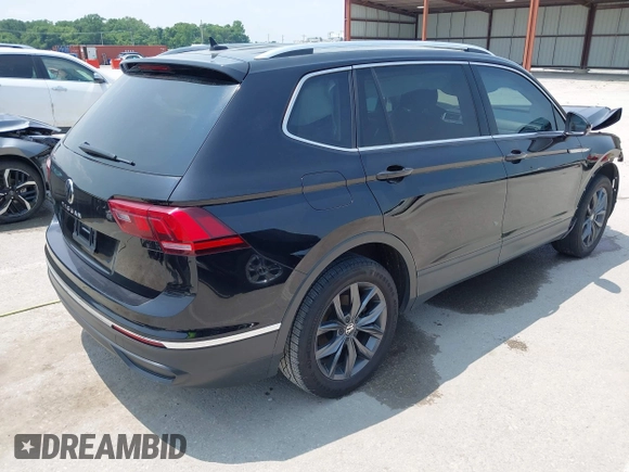 2023 Volkswagen Tiguan SE with VIN 3VVNB7AX5PM017938, listed as a IAAI auction lot 42453818 with 177,906 mi miles and . Bid and sale history available at DreamBid. Image 4.
