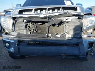 2014 Toyota Tundra 4WD Truck SR with VIN 5TFUW5F19EX330781, listed as a IAAI auction lot 41754261 with 168,388 mi miles. Bid and sale history available at carsss.com. Image 6.