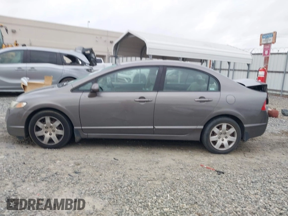 2009 Honda Civic LX z VIN 1HGFA16539L005299, wystawiony jako IAAI lot #41848263 z przebiegiem 169 019 mil mil oraz . Historia ofert i sprzedaży dostępna na DreamBid. Obrazek 14.