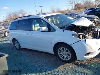 2013 Toyota Sienna XLE AAS with VIN 5TDYK3DC4DS305068, listed as a IAAI auction lot 40909667 with 227,746 mi miles. Bid and sale history available at carsss.com. Image 13.