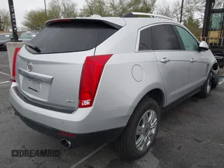 2016 Cadillac SRX Luxury Collection z VIN 3GYFNBE38GS520891, wystawiony jako IAAI lot #41781445 z przebiegiem 52 202 mil mil oraz . Historia ofert i sprzedaży dostępna na DreamBid. Obrazek 4.