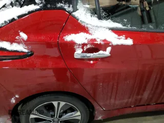 2021 Nissan LEAF SV Plus z VIN 1N4BZ1CV6MC554732, wystawiony jako Copart lot #86534494 z przebiegiem Nie podano mil oraz Szkoda całkowita • Salvage title. Historia ofert i sprzedaży dostępna na DreamBid. Obrazek 11.