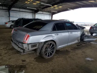 2014 Chrysler 300 with VIN 2C3CCAET6EH118283, listed as a Copart auction lot 86757084 with 113,641 mi miles and Salvage Title. Bid and sale history available at carsss.com. Image 3.