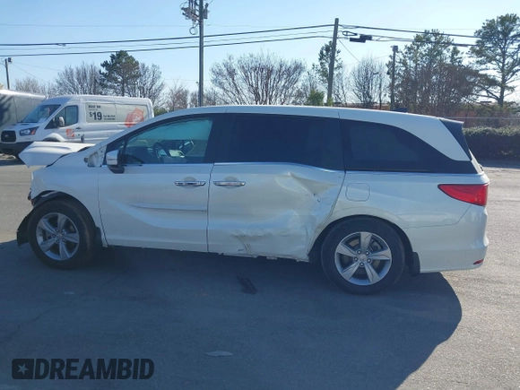 2018 Honda Odyssey EX-L z VIN 5FNRL6H79JB014419, wystawiony jako IAAI lot #41654269 z przebiegiem 84 372 mil mil oraz . Historia ofert i sprzedaży dostępna na DreamBid. Obrazek 14.