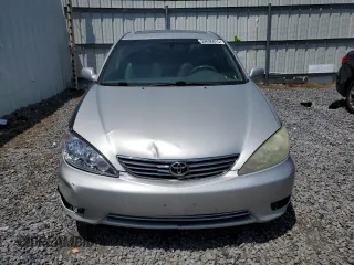 2006 Toyota Camry LE z VIN 4T1BF30K16U630147, wystawiony jako Copart lot #59696815 z przebiegiem 168 727 mil mil oraz Czysty tytuł • Clean title. Historia ofert i sprzedaży dostępna na DreamBid. Obrazek 5.