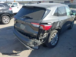 2020 Ford Escape SE with VIN 1FMCU9G63LUA52750, listed as a IAAI auction lot 40952482 with 81,070 mi miles. Bid and sale history available at carsss.com. Image 6.