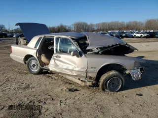 1997 Lincoln Town Car Signature z VIN 1LNLM82W5VY758132, wystawiony jako Copart lot #42643405 z przebiegiem Nie podano mil oraz Szkoda całkowita • Salvage title. Historia ofert i sprzedaży dostępna na DreamBid. Obrazek 4.