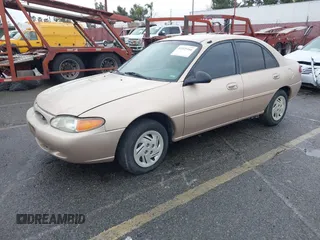 1997 Ford Escort LX with VIN 1FALP13P9VW292877, listed as a IAAI auction lot 41525166 with 91,154 mi miles. Bid and sale history available at carsss.com. Image 2.