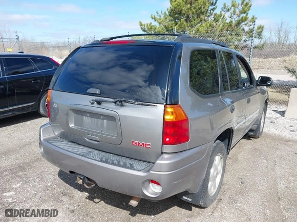 2006 GMC Envoy SLE with VIN 1GKDT13S762336273, listed as a IAAI auction lot 41887848 with 225,535 mi miles. Bid and sale history available at carsss.com. Image 4.