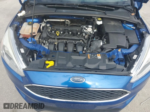 2018 Ford Focus SE z VIN 1FADP3F22JL328761, wystawiony jako Copart lot #45220705 z przebiegiem 71 639 mil mil oraz Szkoda całkowita • Salvage title. Historia ofert i sprzedaży dostępna na DreamBid. Obrazek 12.