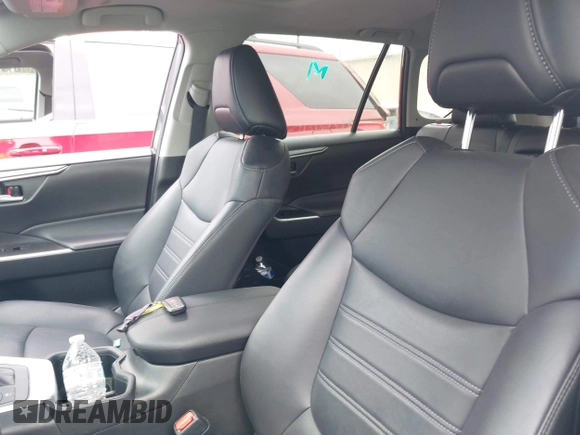 2023 Toyota RAV4 Hybrid XLE Premium with VIN 4T3B6RFV9PU117919, listed as a IAAI auction lot 42528322 with 27,236 mi miles and . Bid and sale history available at DreamBid. Image 18.
