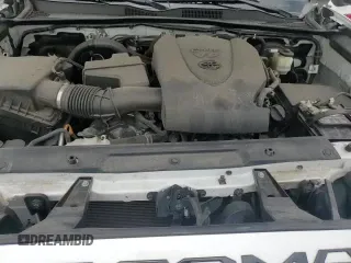 2017 Toyota Tacoma SR5 z VIN 5TFRZ5CN7HX023988, wystawiony jako Copart lot #70519005 z przebiegiem 70 342 mil mil oraz Szkoda całkowita • Salvage title. Historia ofert i sprzedaży dostępna na DreamBid. Obrazek 16.