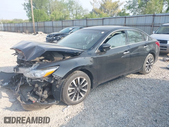 2018 Nissan Altima SR with VIN 1N4AL3AP9JC166595, listed as a IAAI auction lot 42138175 with 98,377 mi miles and . Bid and sale history available at carsss.com. Image 16.