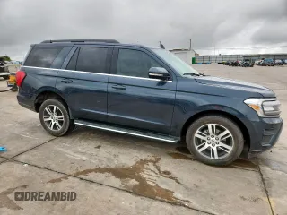 2022 Ford Expedition XLT with VIN 1FMJU1HT5NEA48449, listed as a Copart auction lot 61662065 with 31,418 mi miles and Salvage title. Bid and sale history available at DreamBid. Image 4.
